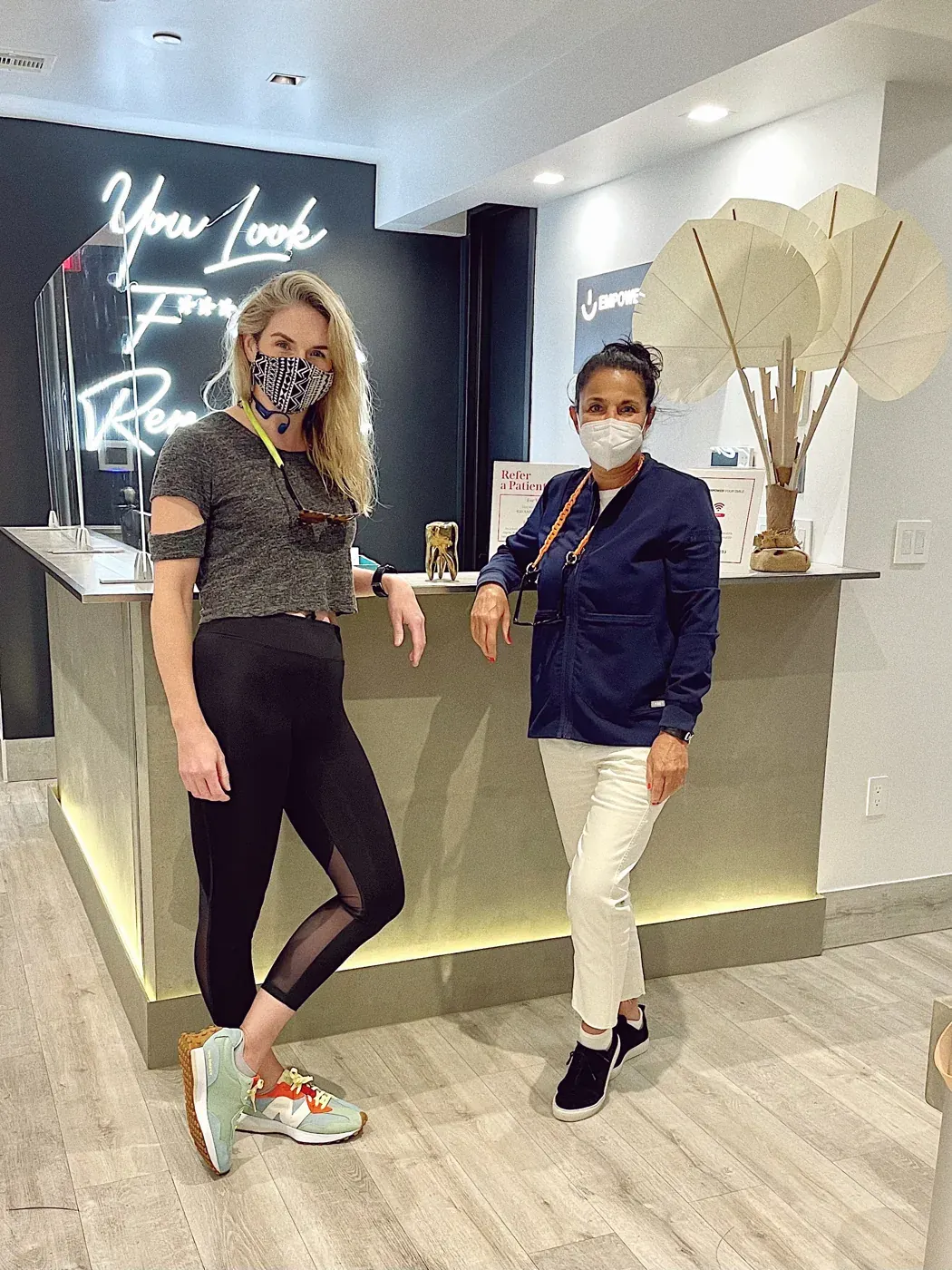 Empower Your Smile patient celebrating a new smile in Tribeca
