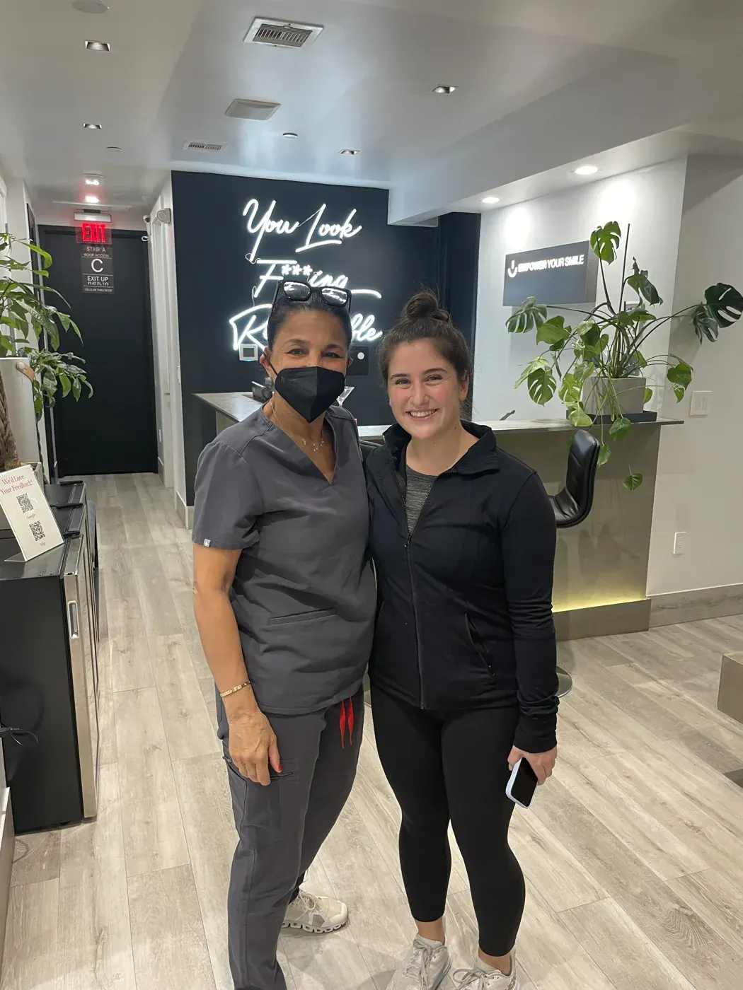 Empower Your Smile patient celebrating a new smile in Tribeca